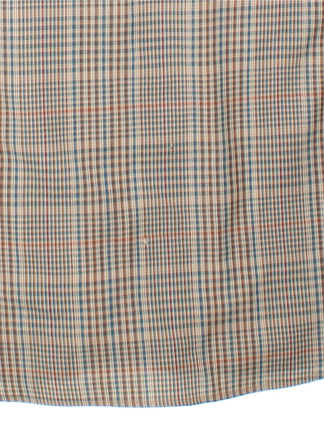 Pendleton Shirt in a brown plaid pattern colourway, buttons up and has a chest pocket on the front.