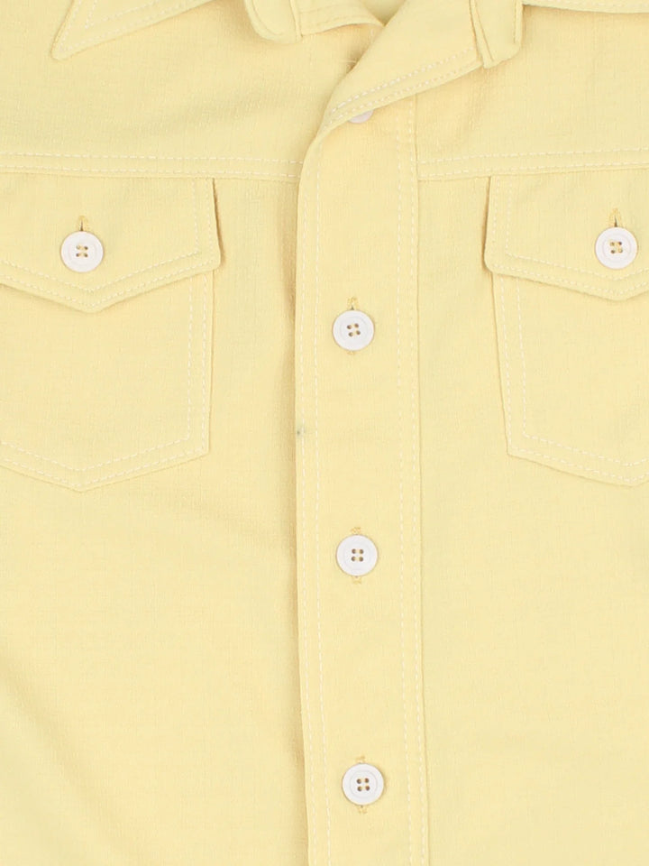 Vintage 70's Shirt in a yellow colourway, button up with front patch pocket detail and dagger collar.