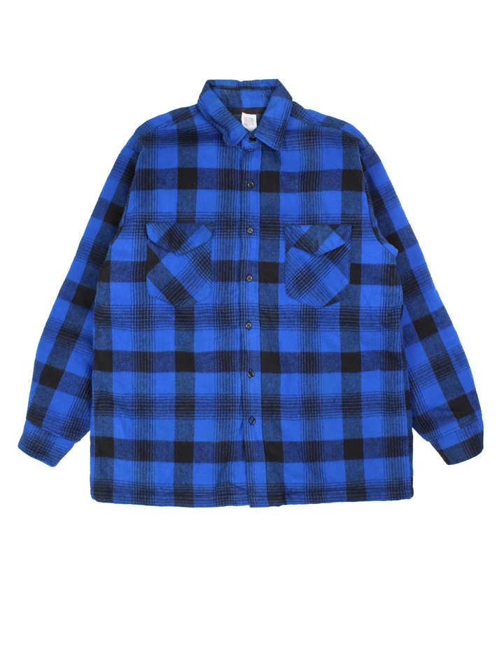 Osh Kosh Flannel Shirt in a blue/black colourway. Button up with front patch pockets and quilted lining.