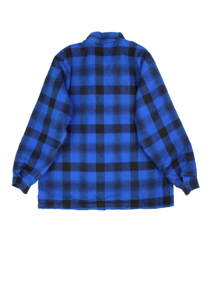 Osh Kosh Flannel Shirt in a blue/black colourway. Button up with front patch pockets and quilted lining.