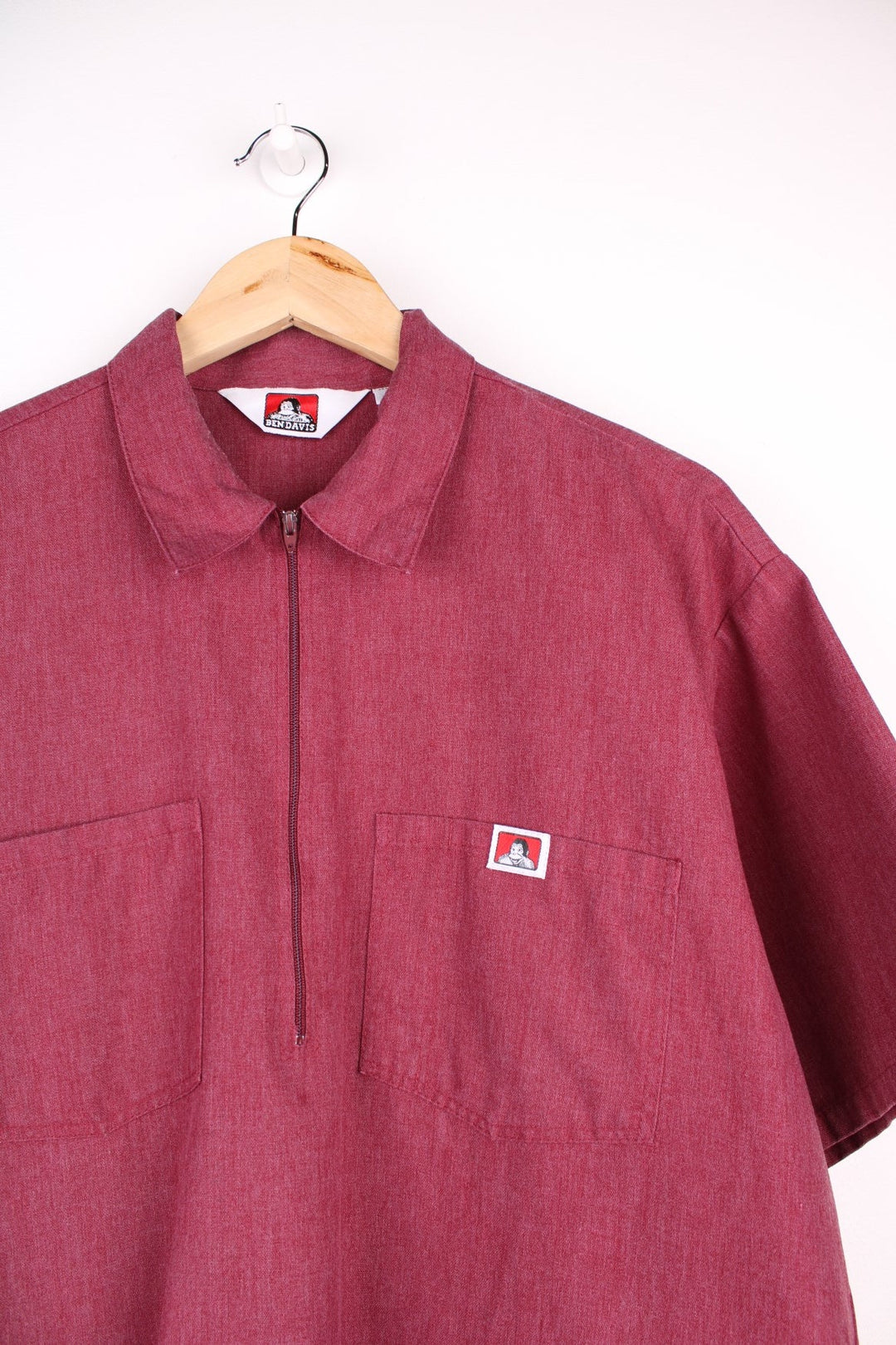 Ben Davis short-sleeved shirt in dark red with 1/2 zip closure, two pockets and a small embroidered monkey logo patch.