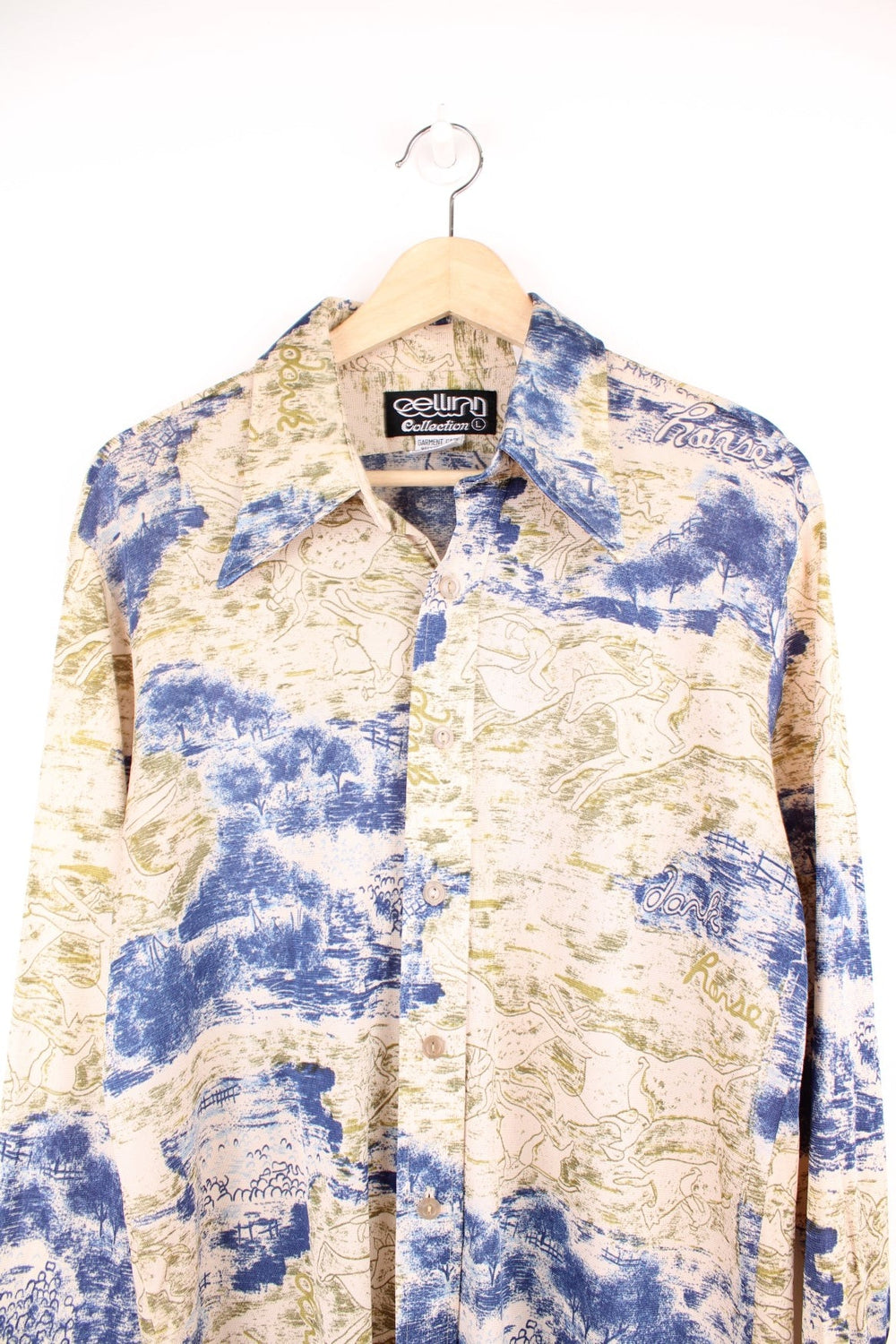Vintage Cellina Collection lightweight polyester shirt with tan, blue, and green horse and jockey print with 'dark horse' and 'horse racer' spellouts. 