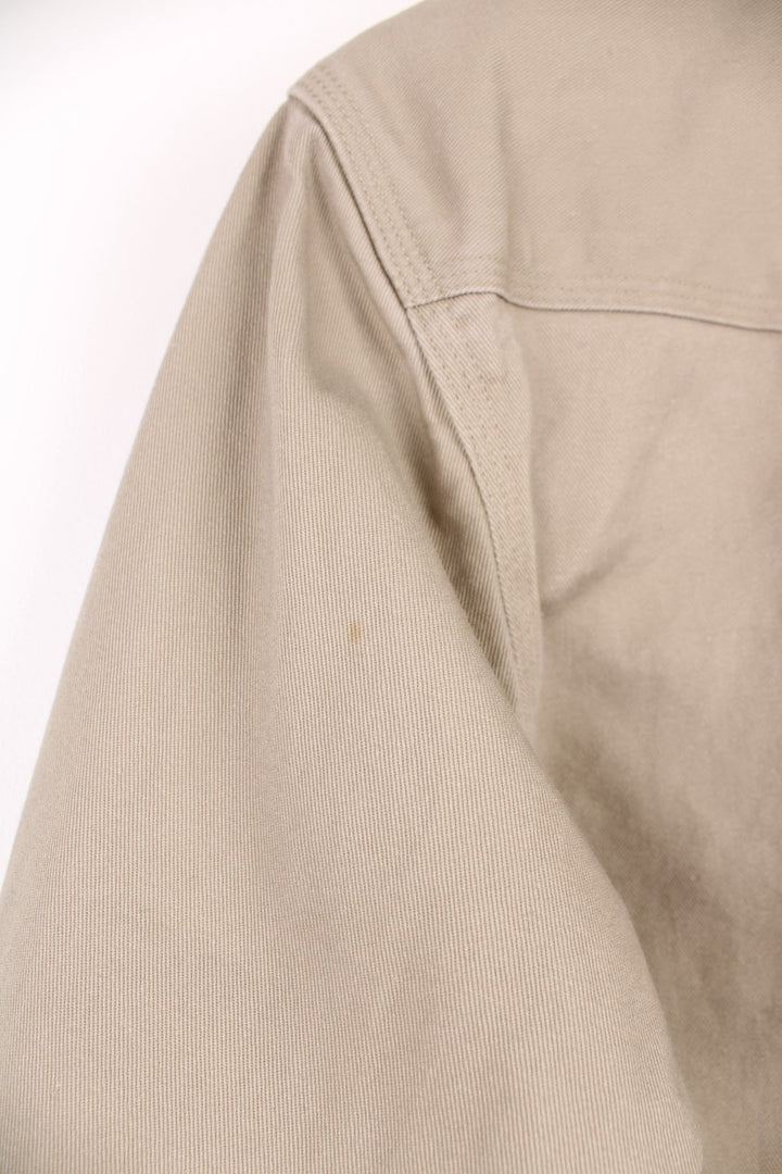 Carhartt western style shirt with pearl snap fastenings and Great Northern Classic, Rodeo Champion Barrels 2015 embroidery on the sleeve. 