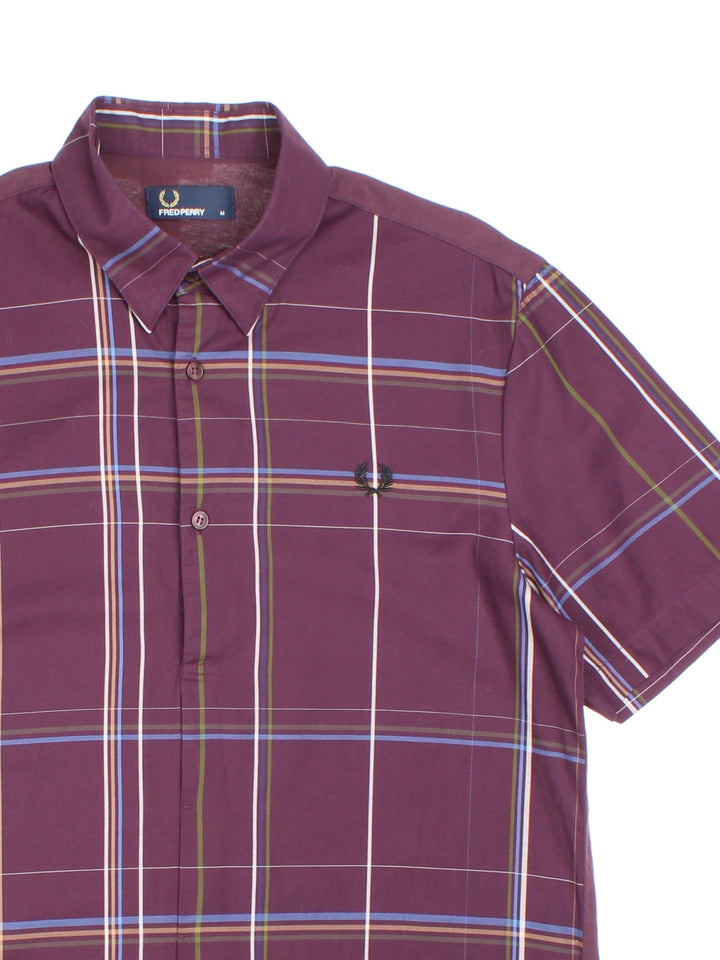 Fred Perry Shirt in a purple colourway, button up with jersey back and embroidered front logo.