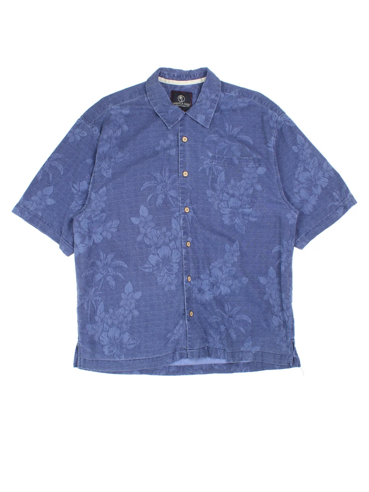 Vintage Hawaiian Shirt in a blue colourway and has a floral pattern all over, button up with a chest pocket.
