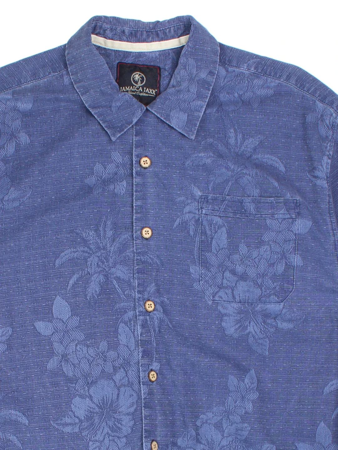 Vintage Hawaiian Shirt in a blue colourway and has a floral pattern all over, button up with a chest pocket.