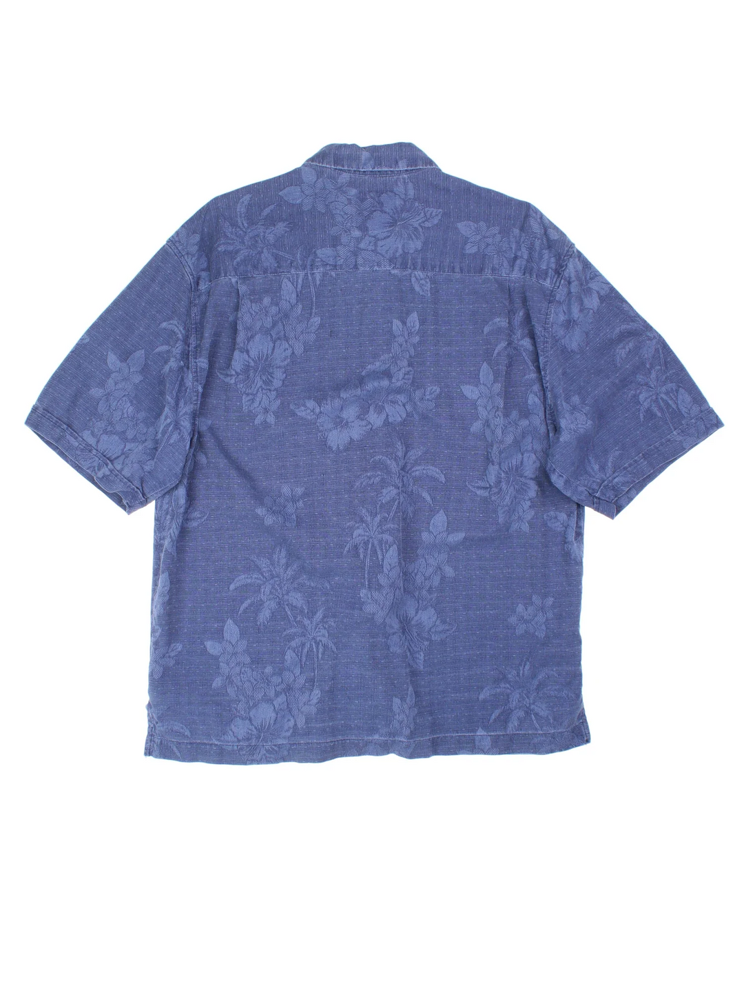 Vintage Hawaiian Shirt in a blue colourway and has a floral pattern all over, button up with a chest pocket.