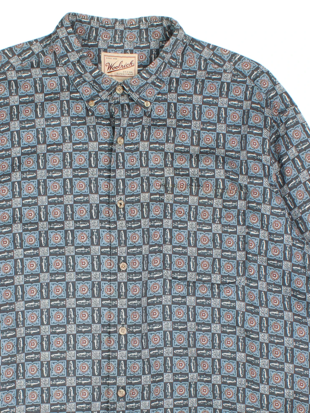 Vintage Woolrich Fish Shirt in a blue colourway with all over fish pattern, button up and has a chest pocket.