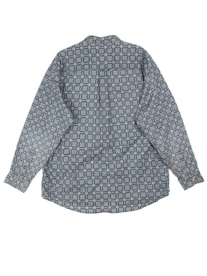 Vintage Woolrich Fish Shirt in a blue colourway with all over fish pattern, button up and has a chest pocket.