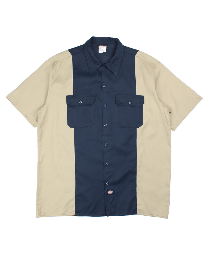 Dickies Two Tone Work Shirt in a blue and tan colourway, button up and has double chest pockets with the logo embroidered on the front.