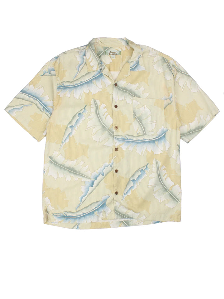 Vintage Tommy Bahama Hawaiian Shirt in a yellow colourway, button up and has a chest pocket.