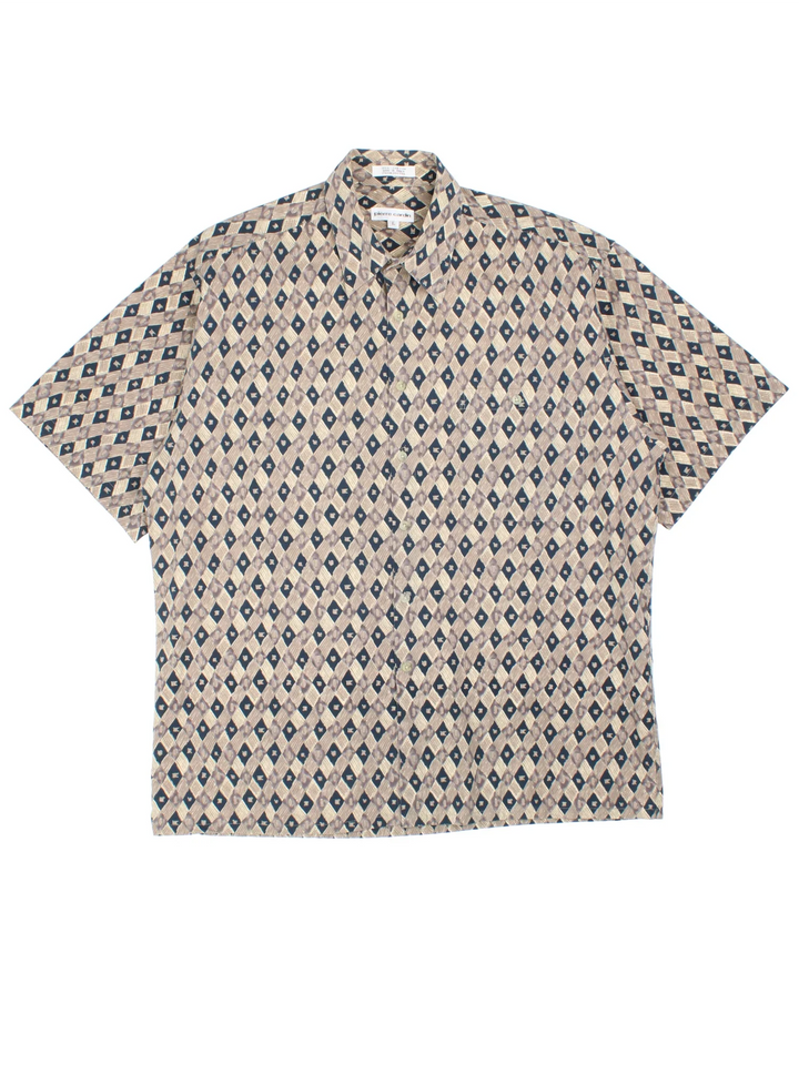 Vintage Pierre Cardin Abstract Pattern Shirt in a tan and navy colourway, button up and has a chest pocket.