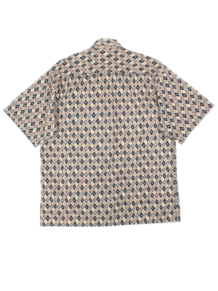 Vintage Pierre Cardin Abstract Pattern Shirt in a tan and navy colourway, button up and has a chest pocket.
