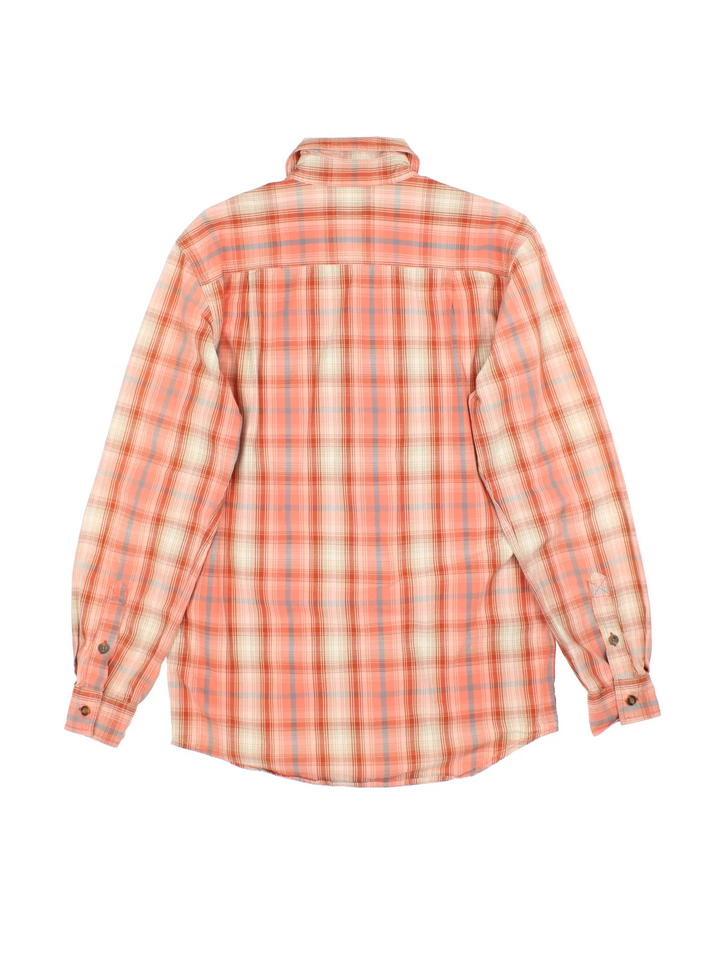 Carhartt Shirt in a orange plaid colourway, buttons up and has double chest pockets with the logo embroidered on the front.