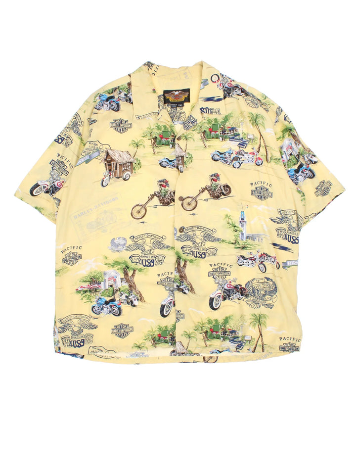 Harley-Davidson Hawaiian Shirt in a yellow colourway, button up and has a chest pocket, and the logo and graphics printed all over.