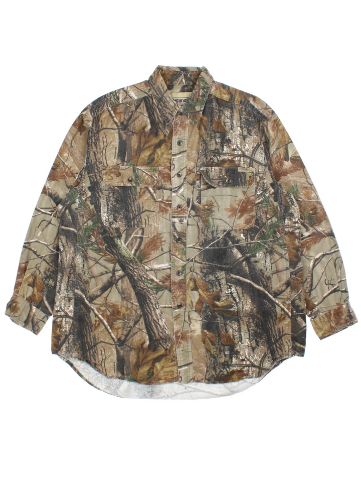 Wrangler Pro Gear Real Tree Camo Shirt in a green and brown colourway, buttons up and has double chest pockets on the front.