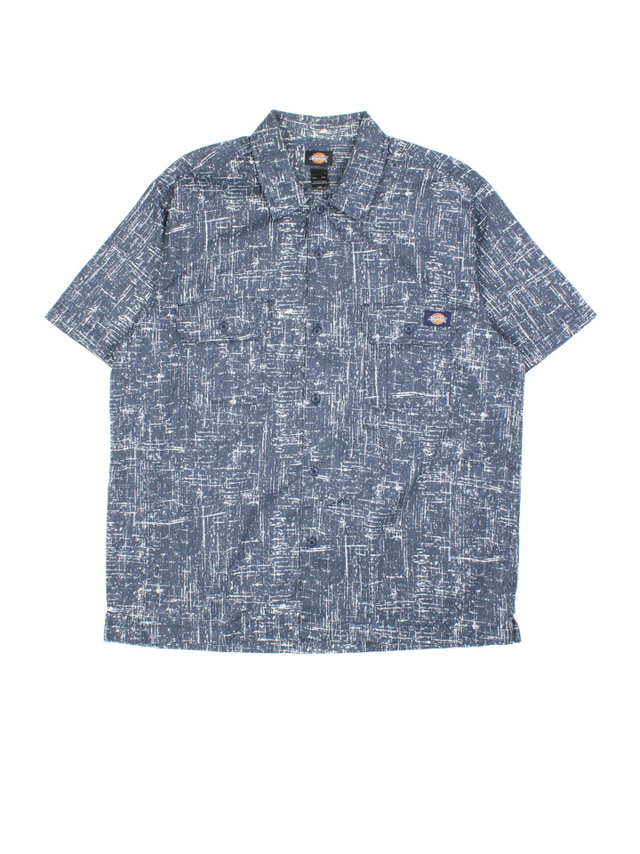 Dickies Work Shirt in a blue and white patterned colourway, buttons up and has double chest pockets with the logo embroidered on the front.