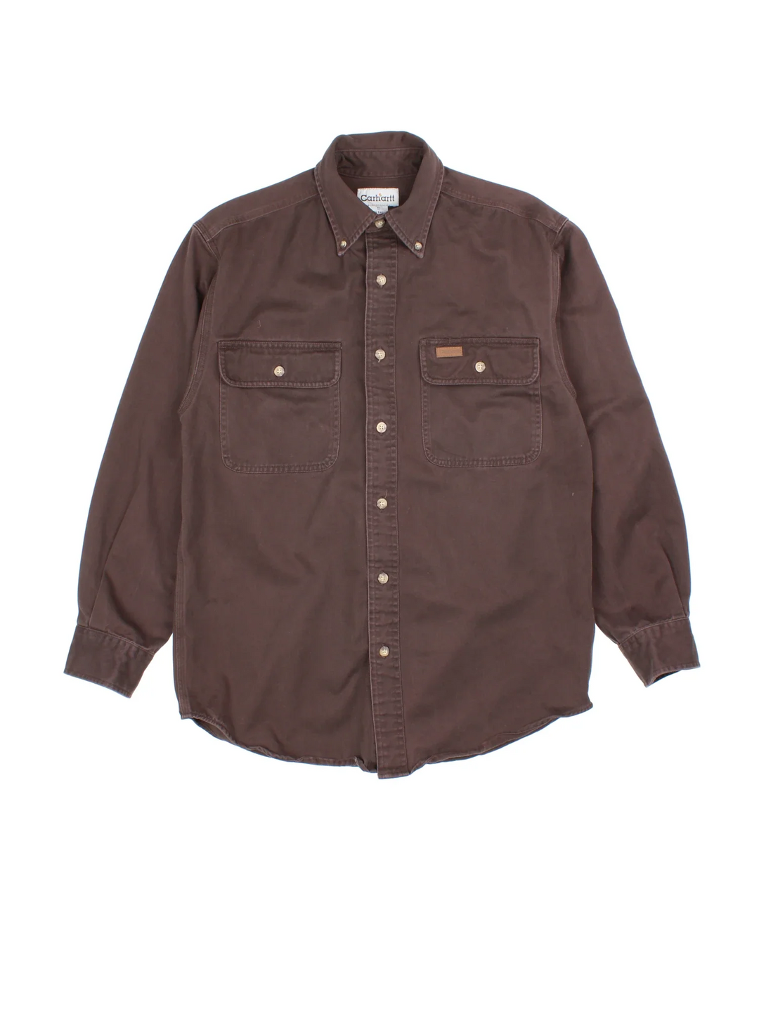 Carhartt Work Shirt in a brown colourway, buttons up and has double chest pockets with the logo embroidered on the front.