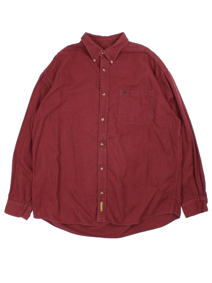 Timberland Shirt in a red colourway, button up with the logo embroidered on the front.