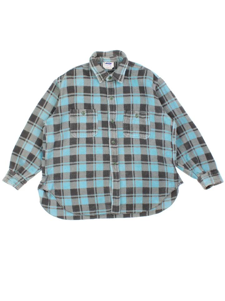 Vintage 1960 Champion Flannel Shirt Shirt in a blue and grey colourway, button up with double chest pockets.