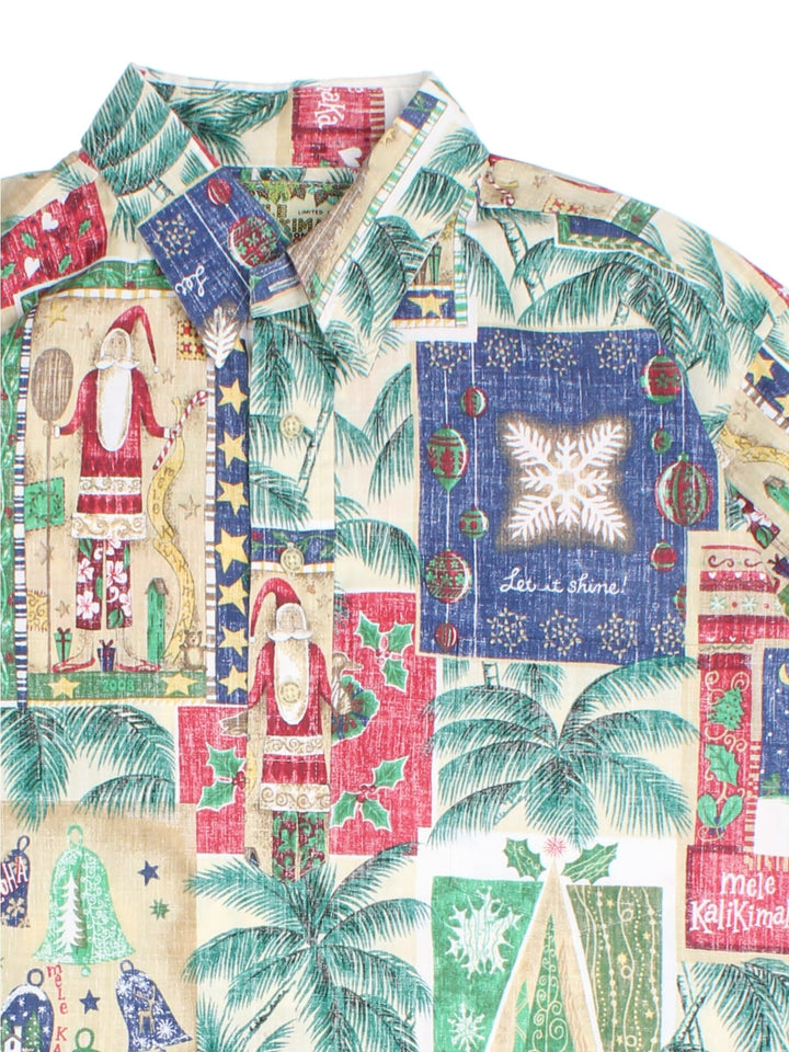  Reyn Spooner Mele Kalikimaka Hawaiian Santa Shirt in a /multi colourway, all over pattern and front pocket.