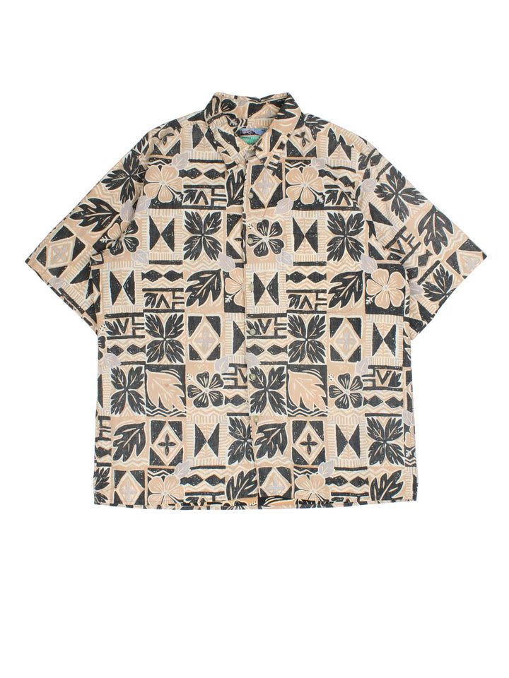 Vintage Reyn Spooner Hawaiian Shirt in a tan/black colourway, all over abstract pattern and front patch pocket.