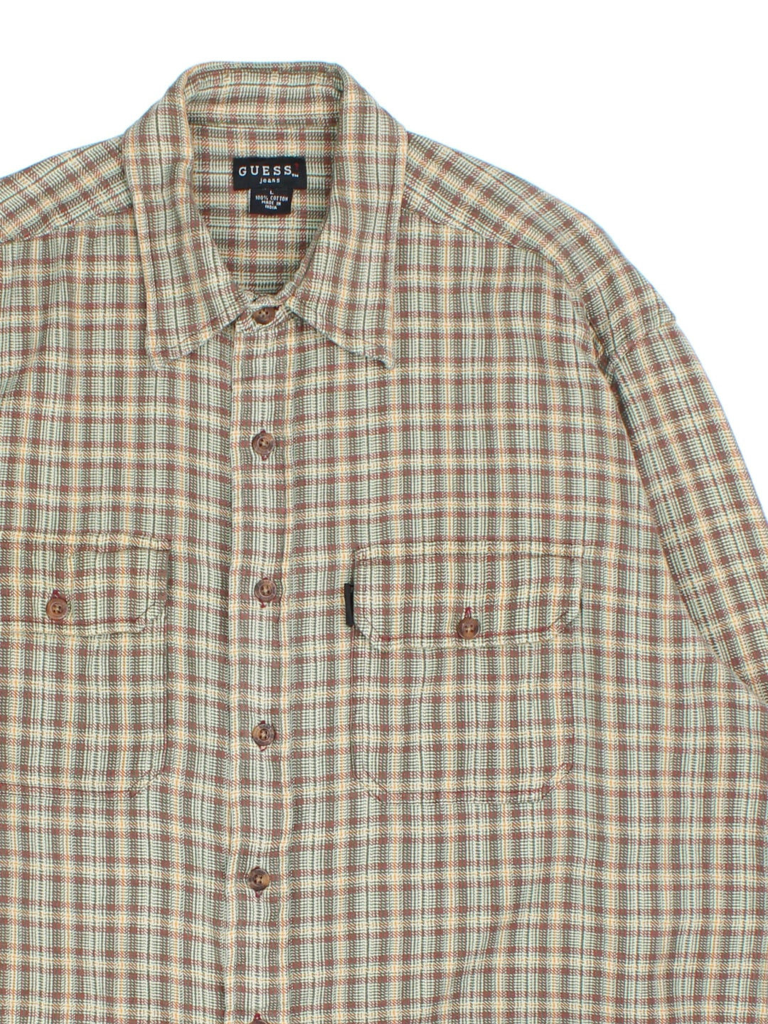 Guess Shirt in a tan/yellow checked colourway. Button up with two front pockets and branded tab.
