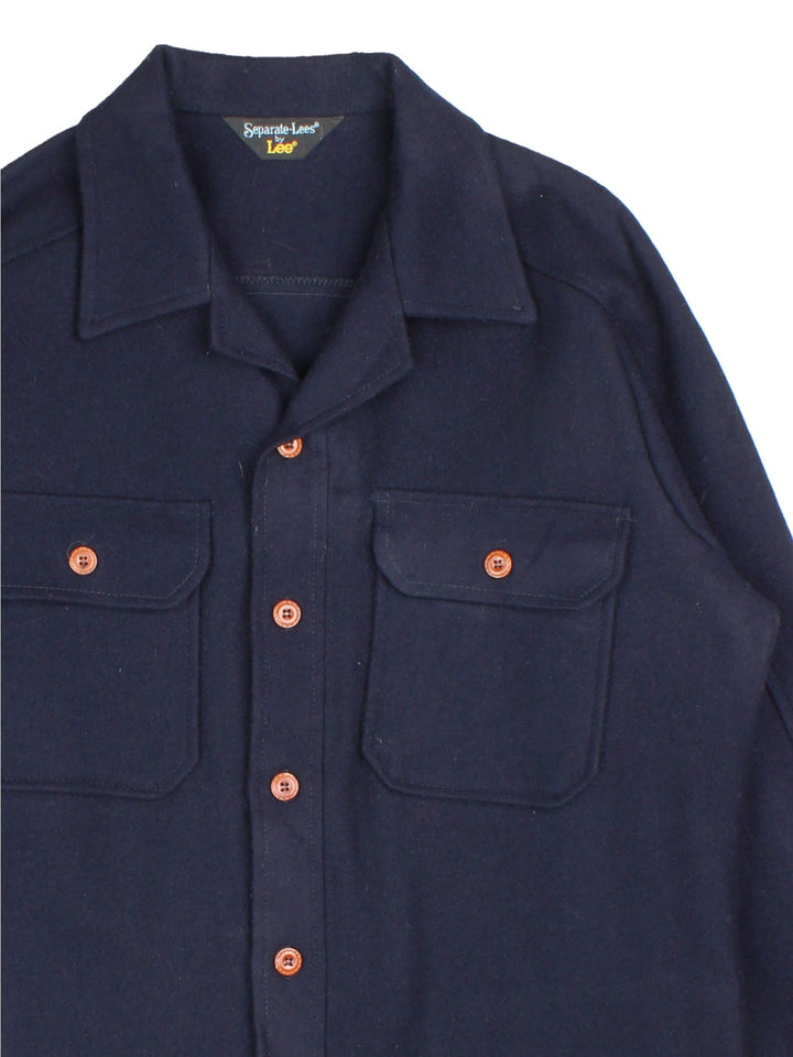 Vintage Lee Overshirt in a blue colourway. Button up with rever collar and front patch pockets.