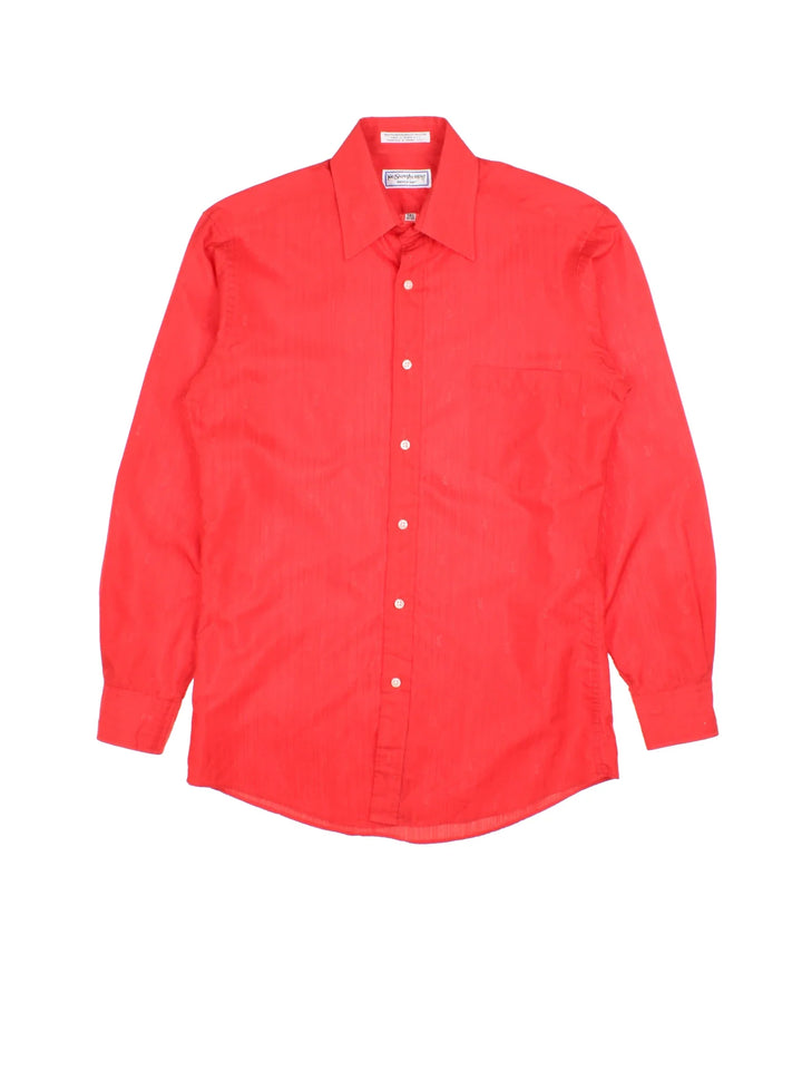 Yves Saint Laurent Shirt in a red colourway, button up and has a chest pocket with the logo printed in the fabric all over.
