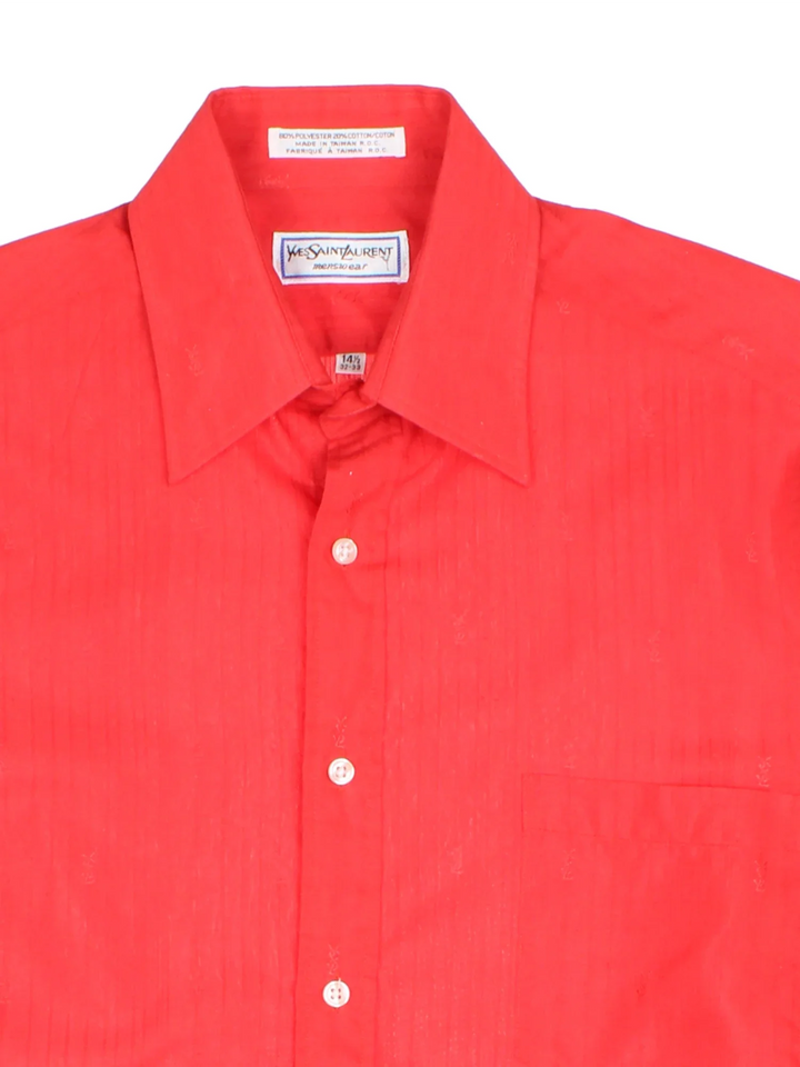 Yves Saint Laurent Shirt in a red colourway, button up and has a chest pocket with the logo printed in the fabric all over.