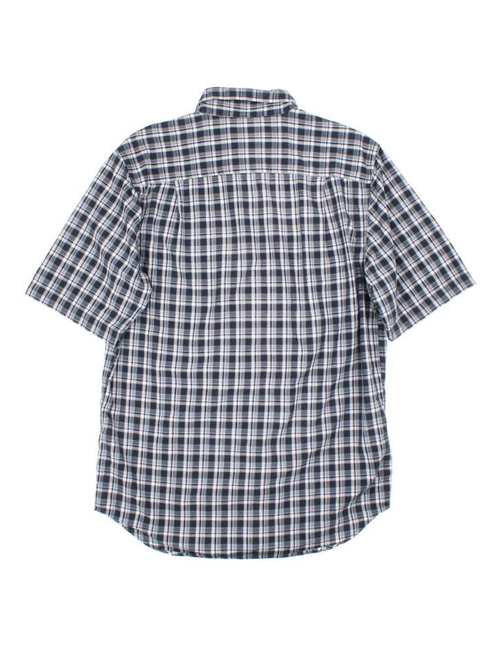 Carhartt Plaid Shirt in a blue and white colourway, button up and has double chest pockets with the logo embroidered on the front.