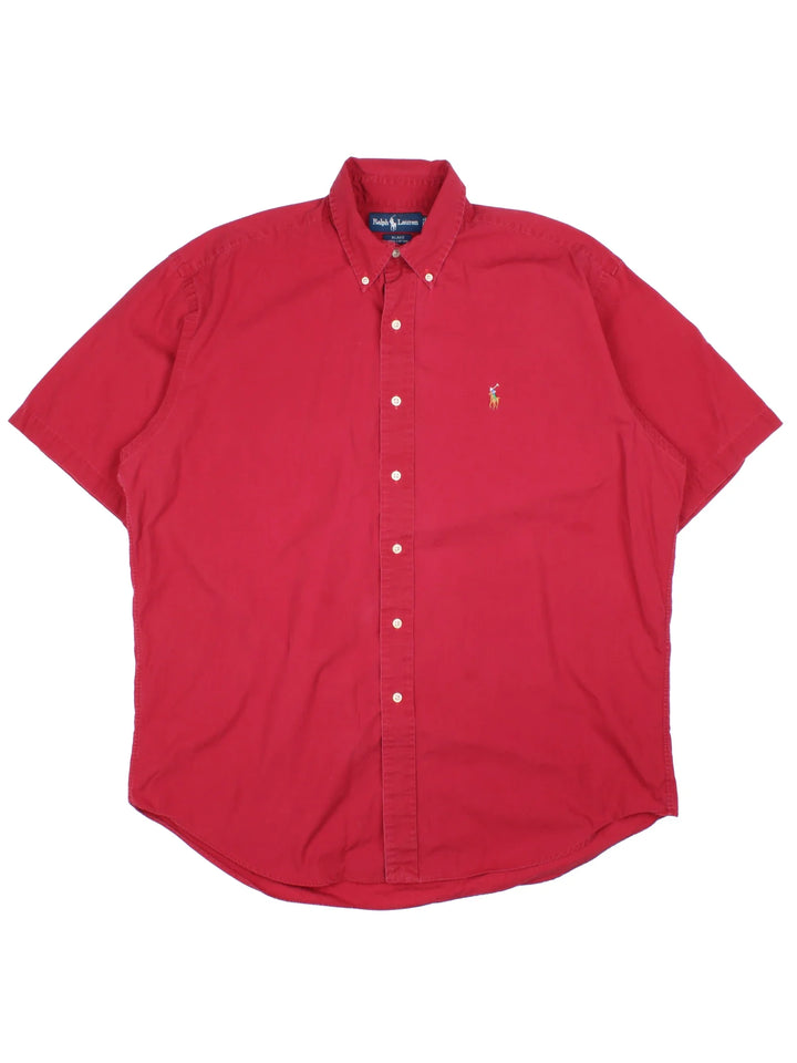 Ralph Lauren Shirt in a red colourway, button up with the logo embroidered on the front.