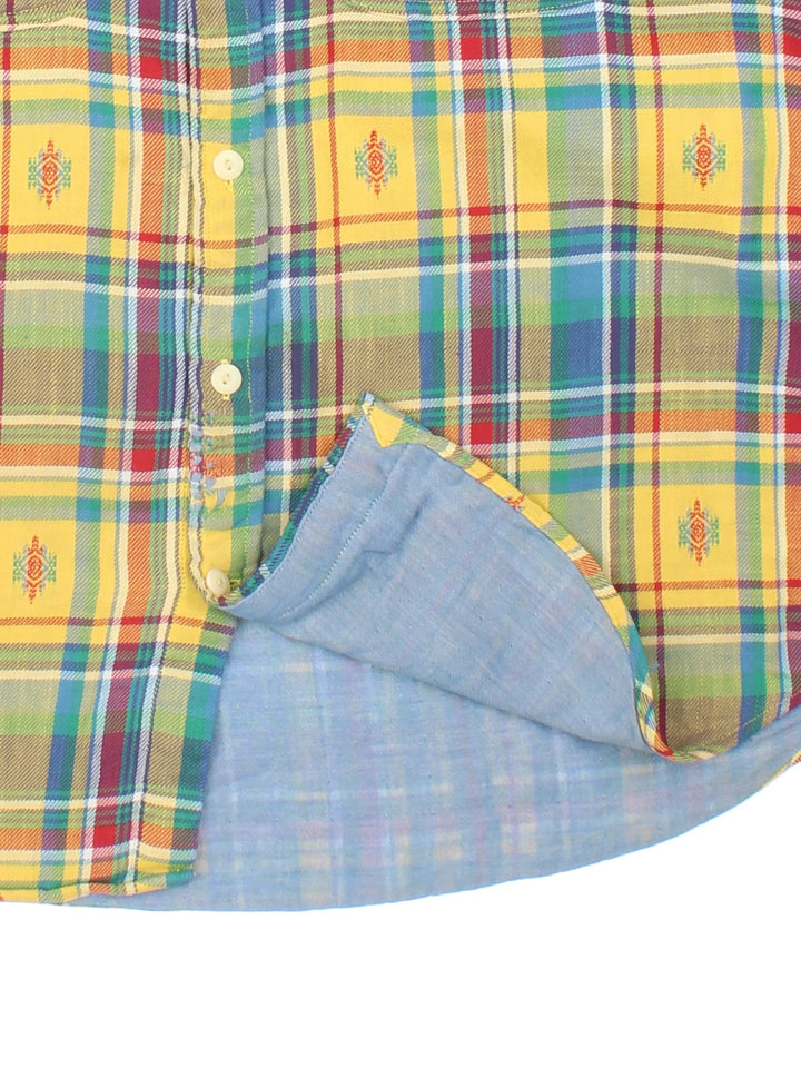 Vintage Ralph Lauren Flannel Shirt in a yellow colourway, button up and has double chest pockets, with Aztec pattern all over.