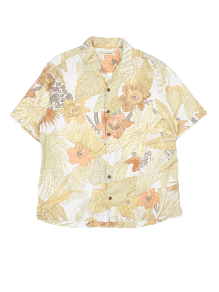 Tommy Bahama Floral Hawaiian Shirt in a yellow colourway, button up with a camp collar, and has a chest pocket.