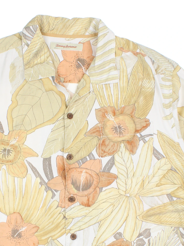 Tommy Bahama Floral Hawaiian Shirt in a yellow colourway, button up with a camp collar, and has a chest pocket.