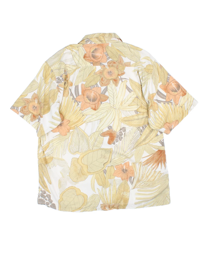 Tommy Bahama Floral Hawaiian Shirt in a yellow colourway, button up with a camp collar, and has a chest pocket.