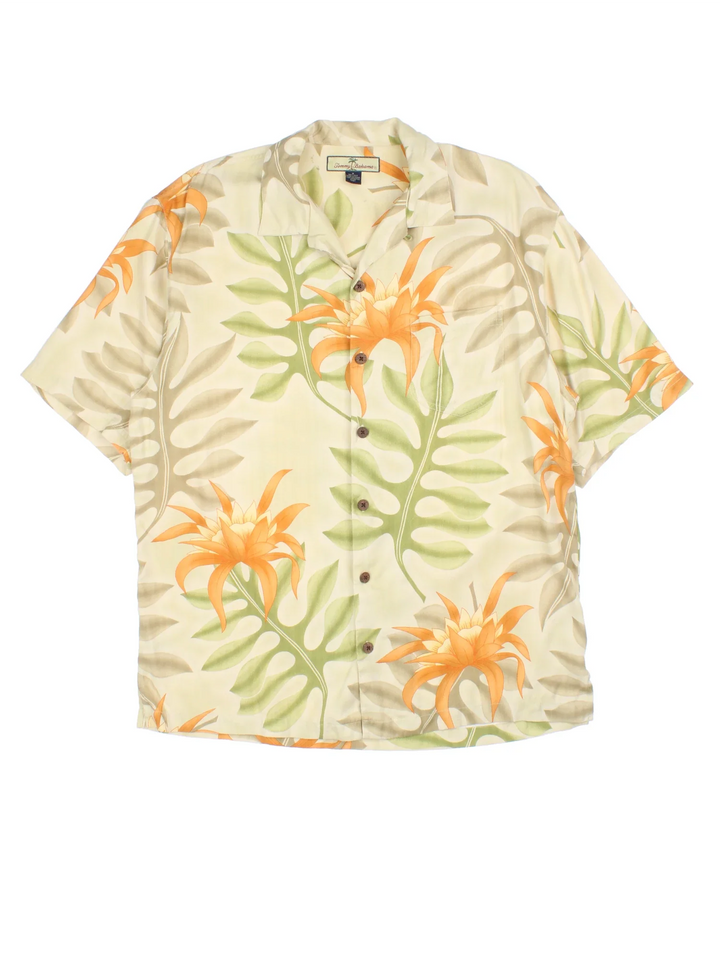 Tommy Bahama Floral Hawaiian Shirt in a yellow colourway, button up and has a chest pocket.