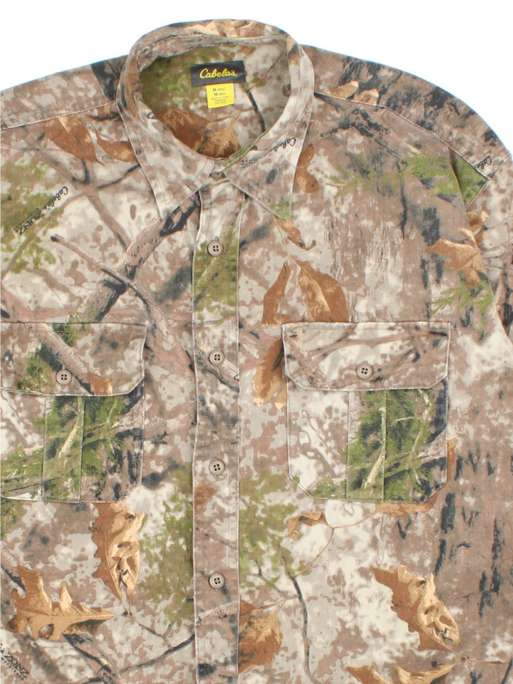 Vintage Cabela's Forest Camo Shirt in a brown colourway, button up and has double chest pockets.