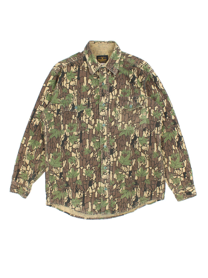 Vintage 90's Deerskin Camo Shirt in a brown and green colourway, button up and has double chest pockets on the front.