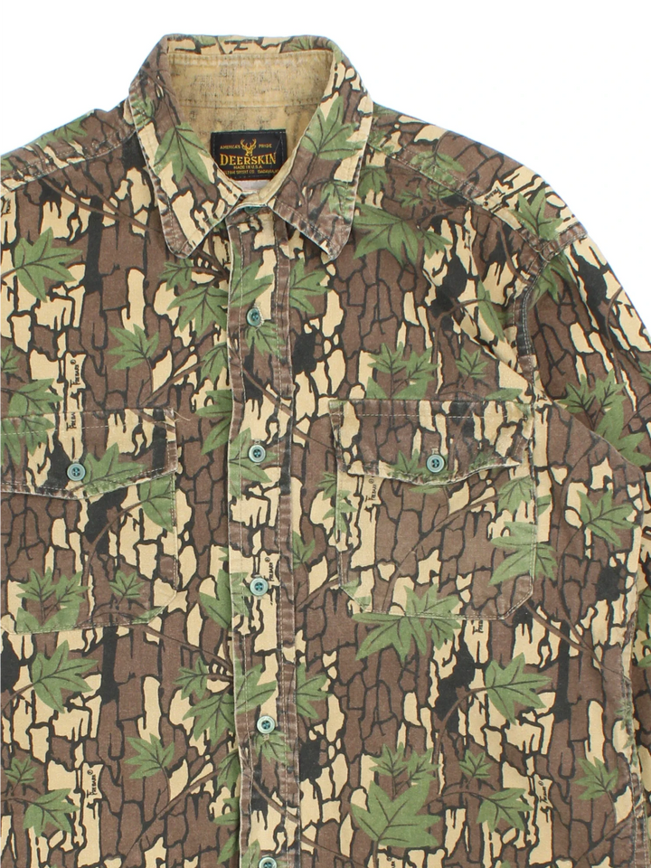 Vintage 90's Deerskin Camo Shirt in a brown and green colourway, button up and has double chest pockets on the front.