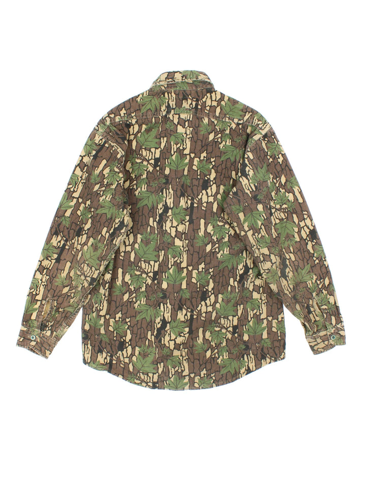 Vintage 90's Deerskin Camo Shirt in a brown and green colourway, button up and has double chest pockets on the front.