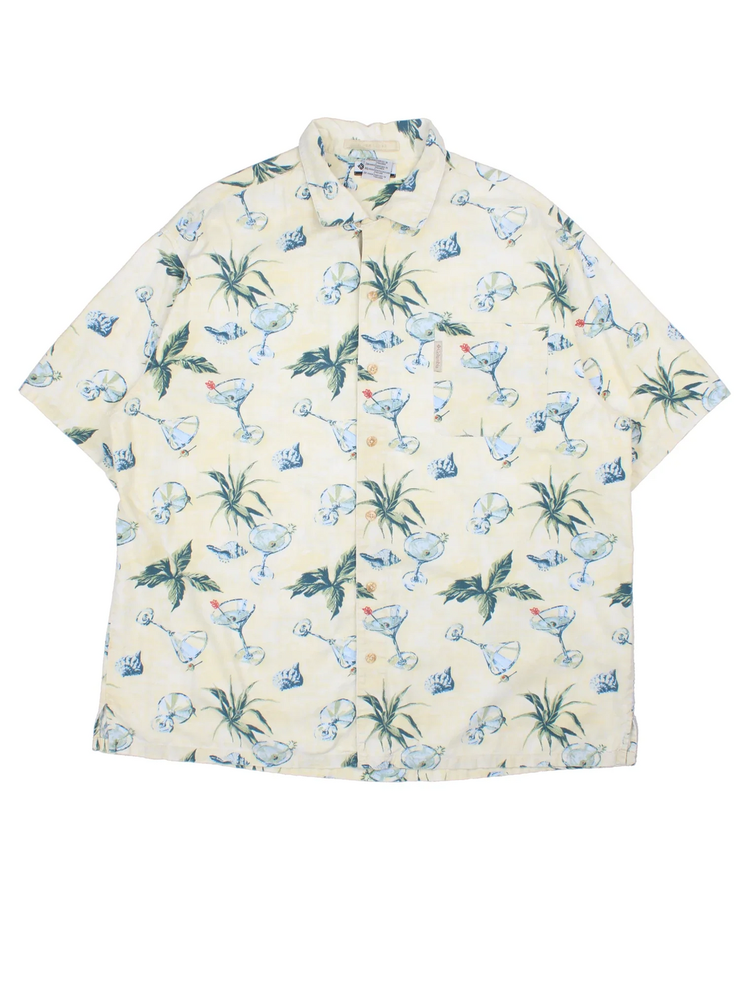 Columbia Hawaiian Shirt in a tan colourway with floral and cocktail all over print, button up and has a chest pocket with the logo embroidered on.