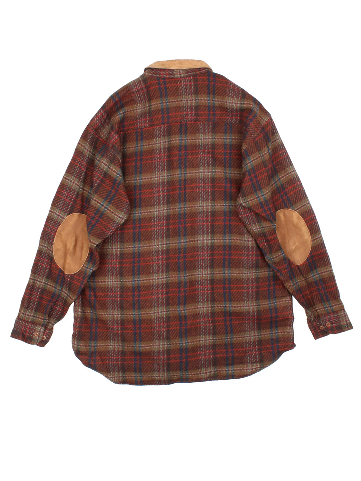 Woolrich Flannel Shirt in a brown colourway, button up and has a chest pocket on the front.