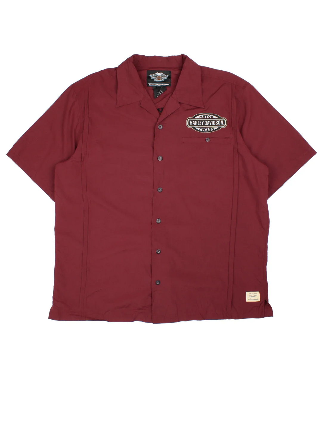 Harley-Davidson Motorcycles Work Shirt in a red colourway, button up and has a chest pocket with the logo embroidered on the front, and large spell out graphic on the back.