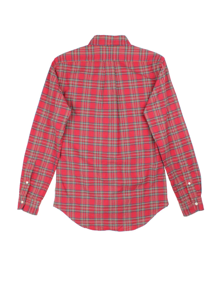 Ralph Lauren Shirt in a red plaid pattern colourway, button up and has a chest pocket with the logo embroidered on the front.
