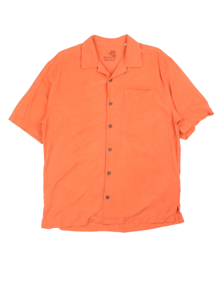 Tommy Bahama Hawaiian Shirt in a orange colourway, button up and has a chest pocket.