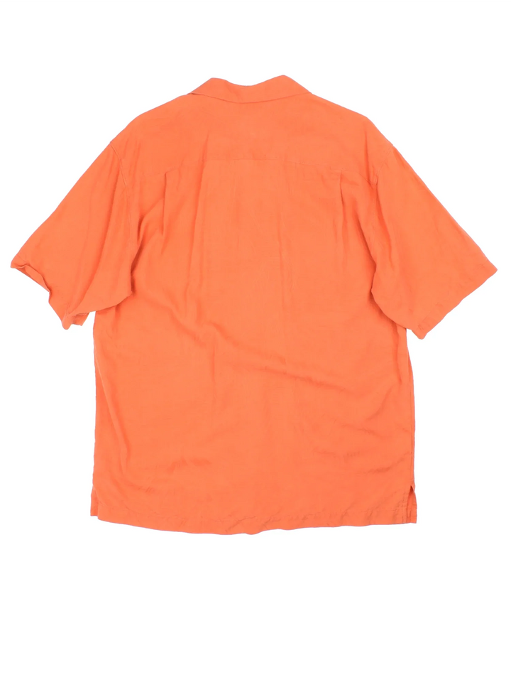 Tommy Bahama Hawaiian Shirt in a orange colourway, button up and has a chest pocket.