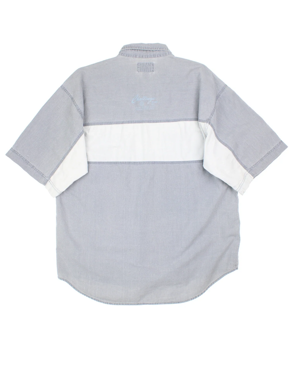 Vintage Bugle Boy Shirt in a grey colourway, button up and has double chest pockets with the logo embroidered on the front.