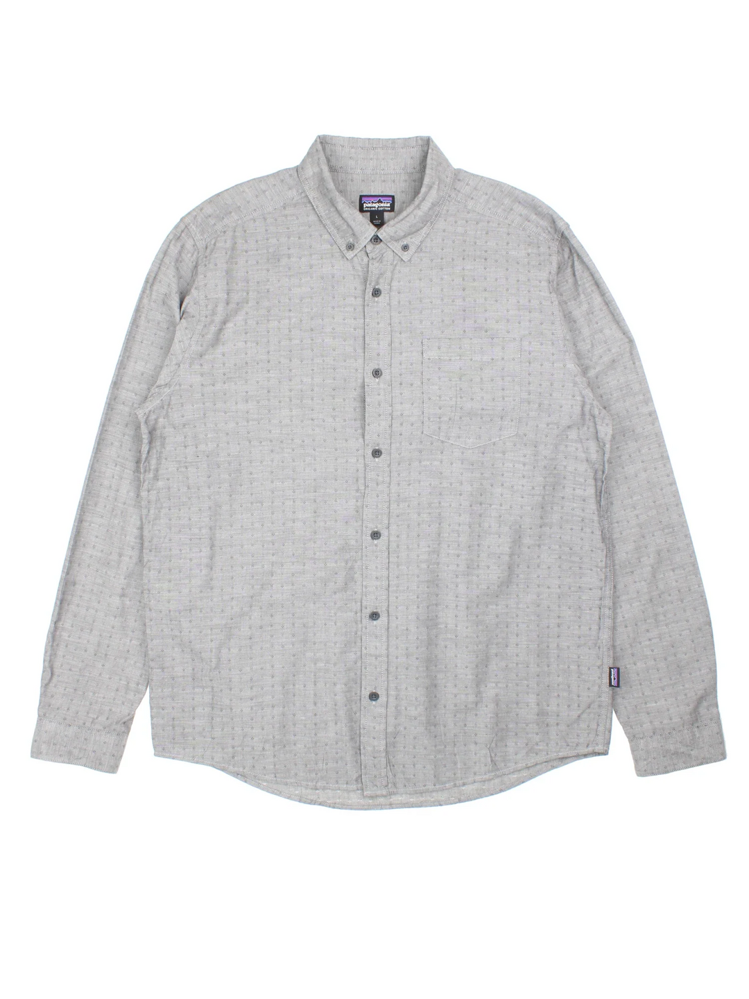 Patagonia Shirt in a grey colourway, button up and has a chest pocket, and the logo tab embroidered on the side.