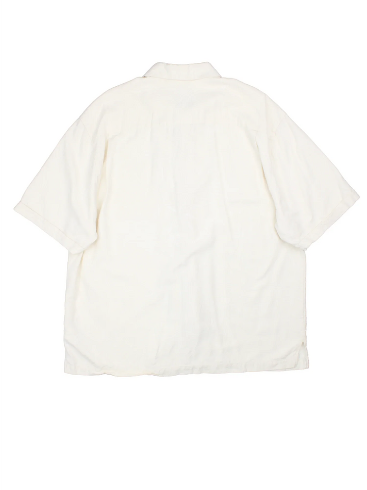 Vintage Hawaiian Shirt in a white colourway with pattern detailing, button up and has a chest pocket.